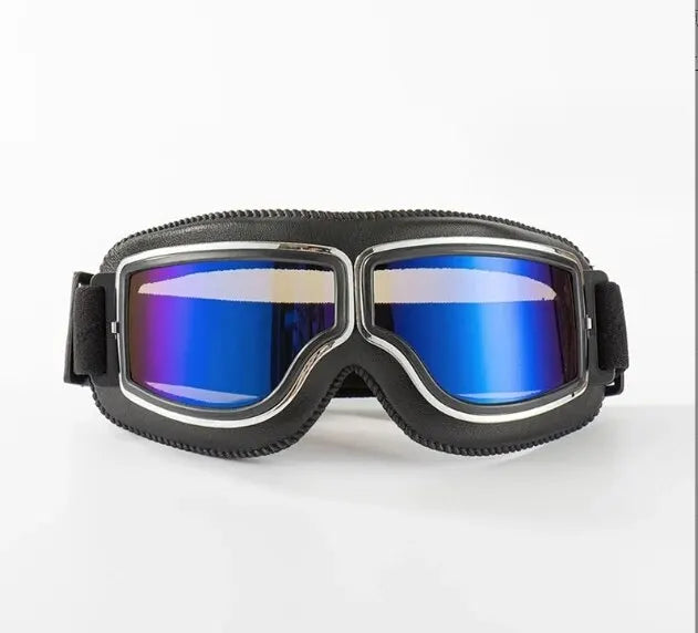 A pair of black retro foldable motorcycle goggles with blue mirrored lenses.