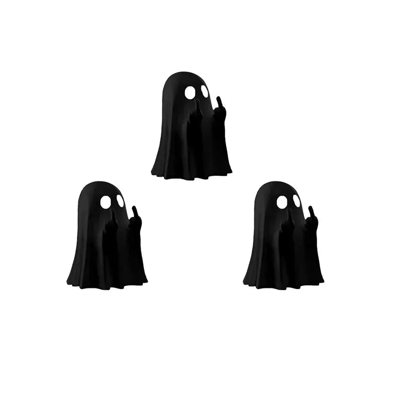 Black resin statue of a ghost with its finger raised, used for Halloween decor.