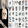 Una cuadrícula de diseños de tatuajes temporales con motivos de luna, estrella, diablo y flor en tinta negra.