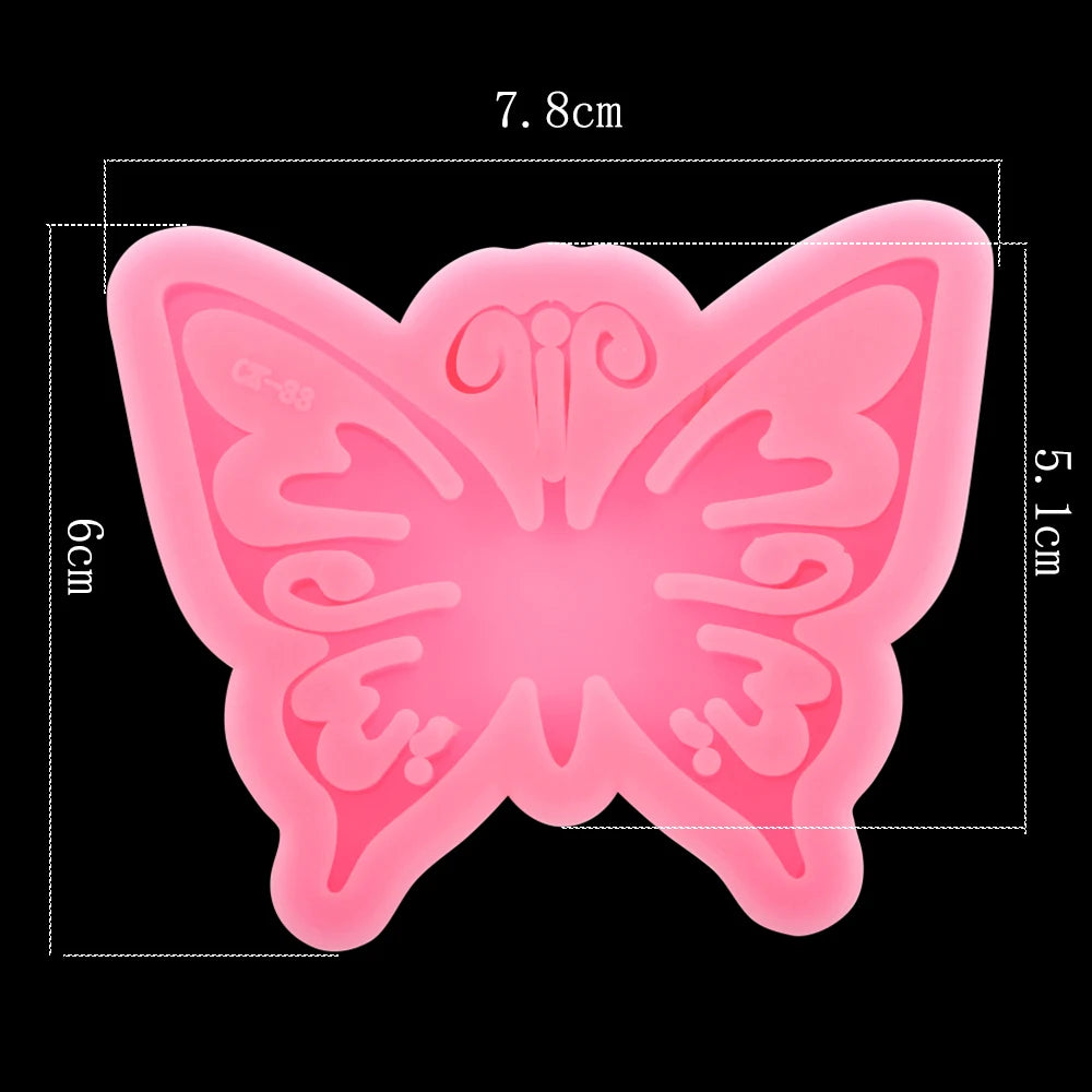 Pink butterfly shape epoxy resin mold with dimensions 7.8cm by 5.1cm