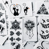 Colección de pegatinas para tatuajes temporales con diseños como gato, rosa, calavera y elementos decorativos.