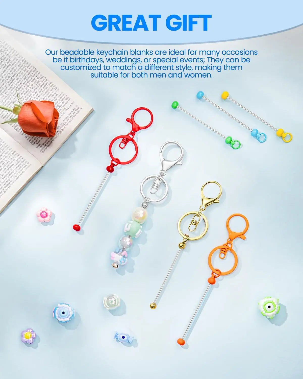 A collection of metal beadable keychain bars in various colors and styles displayed on a light blue background.