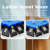Close-up view of a letter reset lever mechanism with Z, A, and B letters visible on black buttons.