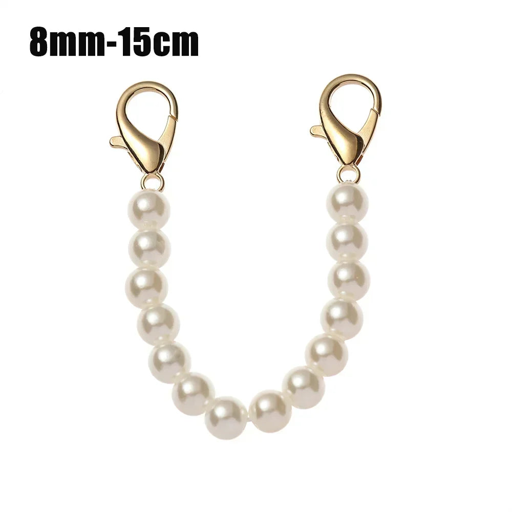 A delicate gold-toned chain strap featuring a strand of small white pearls, measuring 8mm to 15cm.