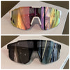 A pair of polarized sunglasses with a gradient lens showing vibrant colors and reflections.
