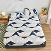 A fitted bed sheet featuring a geometric pattern in navy blue and light blue triangles on a white background.