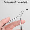 A hand holds professional stainless steel cuticle nippers, demonstrating a comfortable grip.