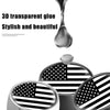 A set of four American flag tire valve caps featuring a black and white striped pattern with stars.