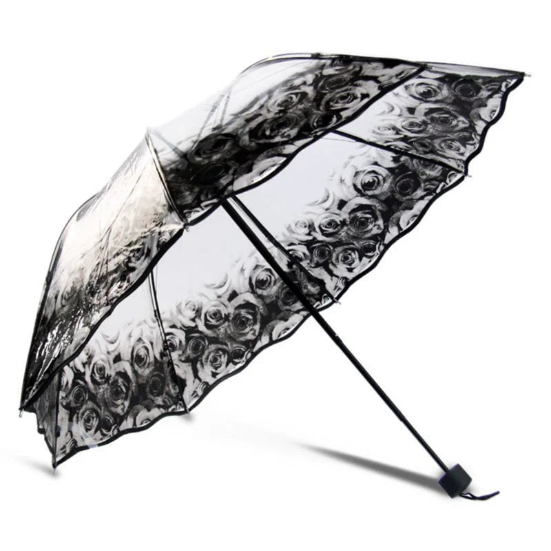A black retro transparent arch umbrella featuring a floral design.