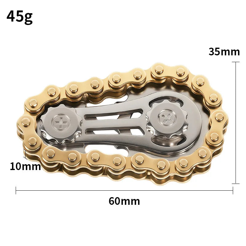 A brass alloy fidget spinner with a silver central mechanism, measuring 45g and 60mm in diameter.