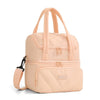 A light peach insulated leakproof reusable lunch bag with pink quilted texture and carrying handles.