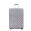 A gray stretchable luggage cover with a diamond pattern and a silver handle and wheels.