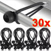Black bungee cords with ball ends shown attached to a silver pole for tent and tarp use