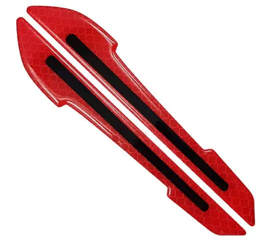 Red reflective safety strips for a car mirror, featuring black stripes.