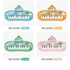 A collection of electronic piano toys in various colors including blue, orange, green, and pink.