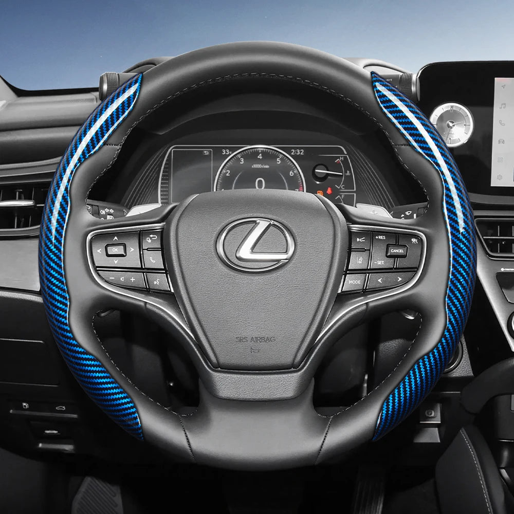 A black steering wheel with blue carbon fiber texture accents and controls in a car interior.