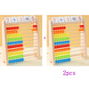 Wooden rainbow counting abacus showing the equation 2 + 3 = 5 with colored beads.