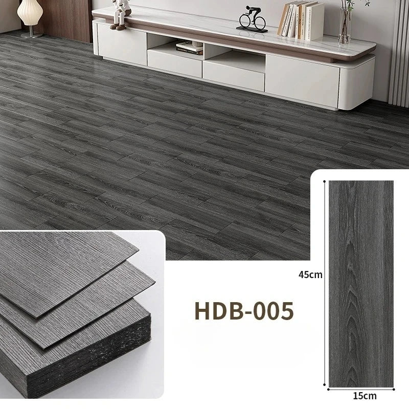 Close-up view of dark gray wood grain floor tiles and a sample board with dimensions 45cm by 15cm.