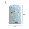 Light blue drawstring laundry bag featuring a pattern of red and white floral designs