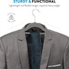 A gray suit jacket with a dark blue tie is hanging on a metal hanger, demonstrating the product's functionality.