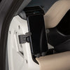 A magnetic car phone mount with a cup holder base is shown mounted in a vehicle interior.