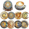 A collection of sparkling diamond painting coasters and a holder featuring sun, moon, and face designs.