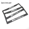 A pair of black racing style license plate frames with AKINA SPEED STARS branding.
