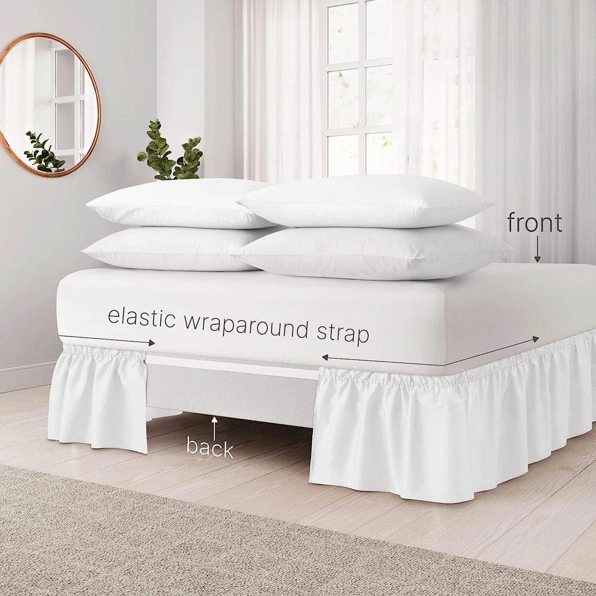 White bed skirt with elegant ruffles and elastic wrap-around strap shown on a bed.