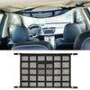 A black mesh ceiling cargo net organizer installed in the roof of a vehicle.