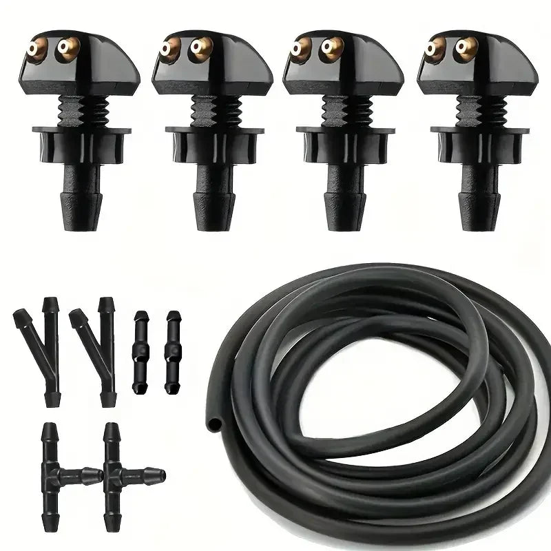 A set of four black windshield washer hose connectors and a coiled black hose.