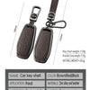 A brown and black leather key shell with a metal chain attached, designed to protect car keys.