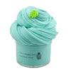 A light mint green tube of slime with a swirl design and a small green leaf on top.