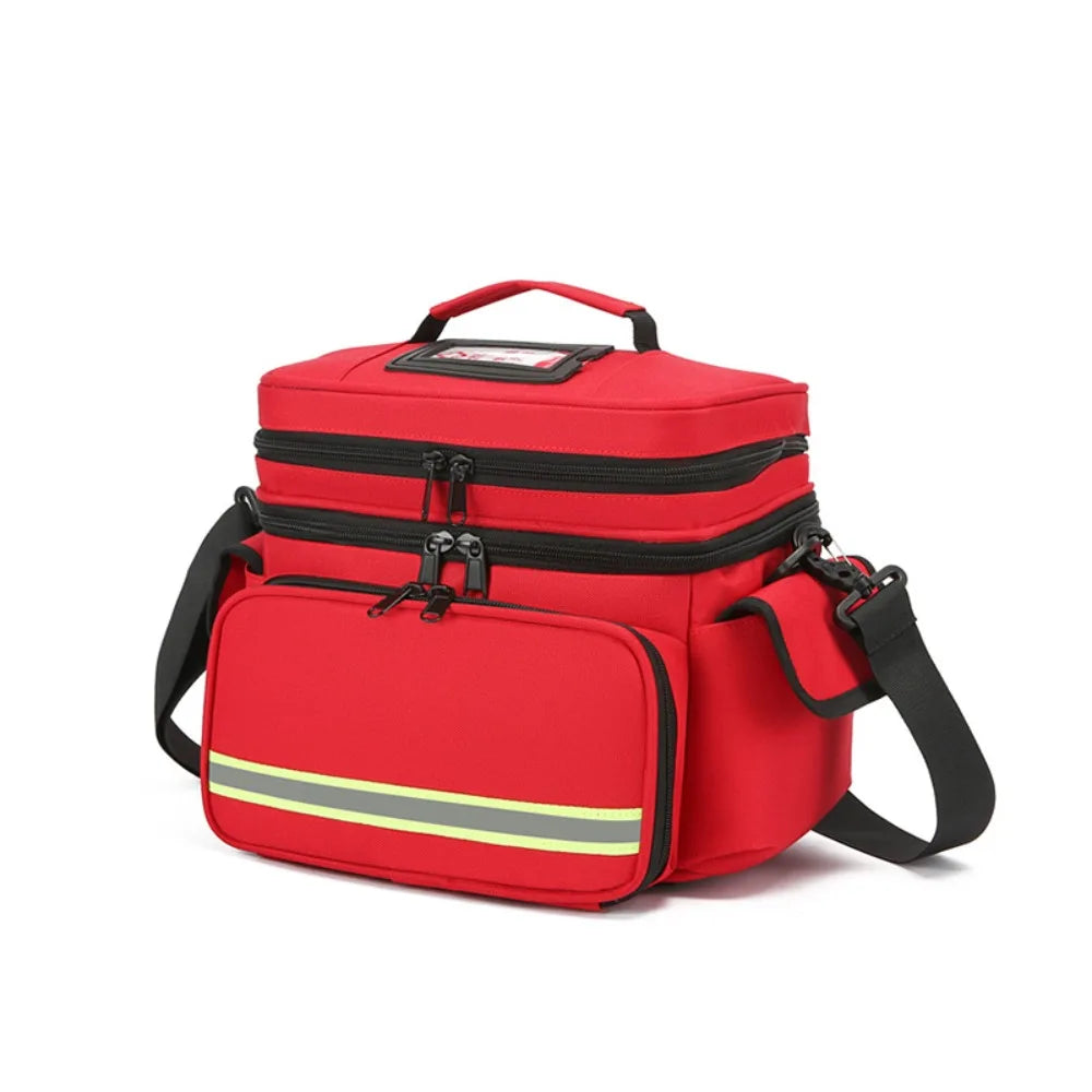 A red and black double-layer trauma and first aid bag with a yellow stripe on a white background.