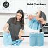 A woman is using a blue microfiber tear-away towel roll for kitchen cleaning, demonstrating its easy to use feature.