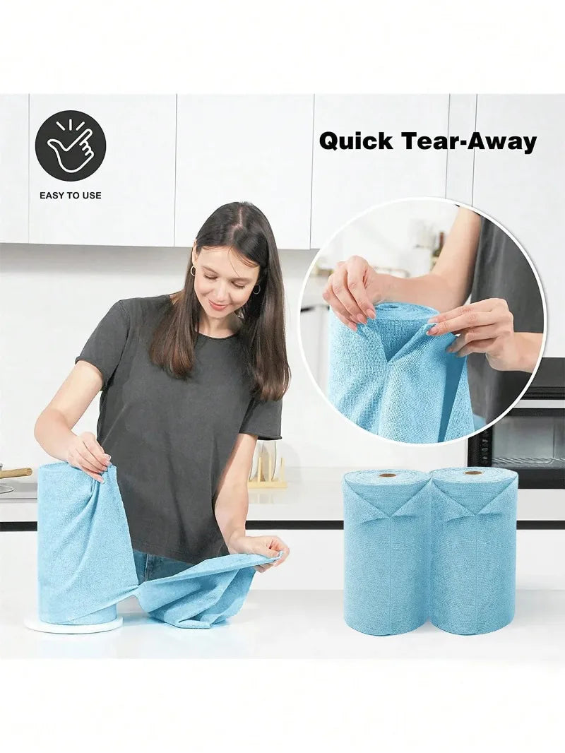 A woman is using a blue microfiber tear-away towel roll for kitchen cleaning, demonstrating its easy to use feature.