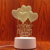 A decorative light display featuring three heart-shaped illusions made of wire mesh on a white base.