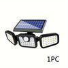 A solar powered security light with a solar panel and multiple LED lights.
