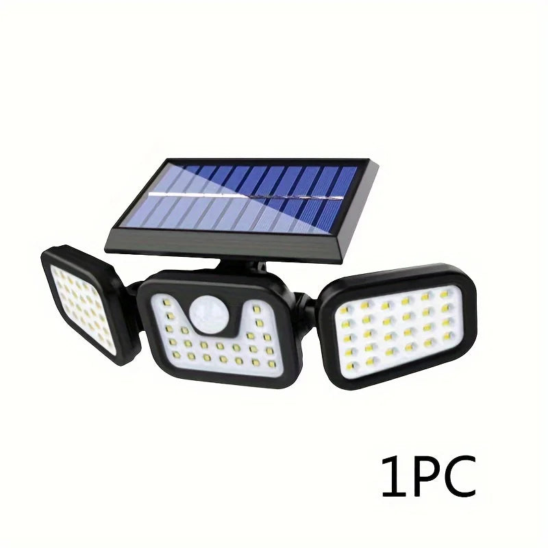A solar powered security light with a solar panel and multiple LED lights.
