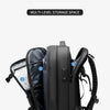 Black expandable travel laptop backpack with vacuum compression features shown from the side.