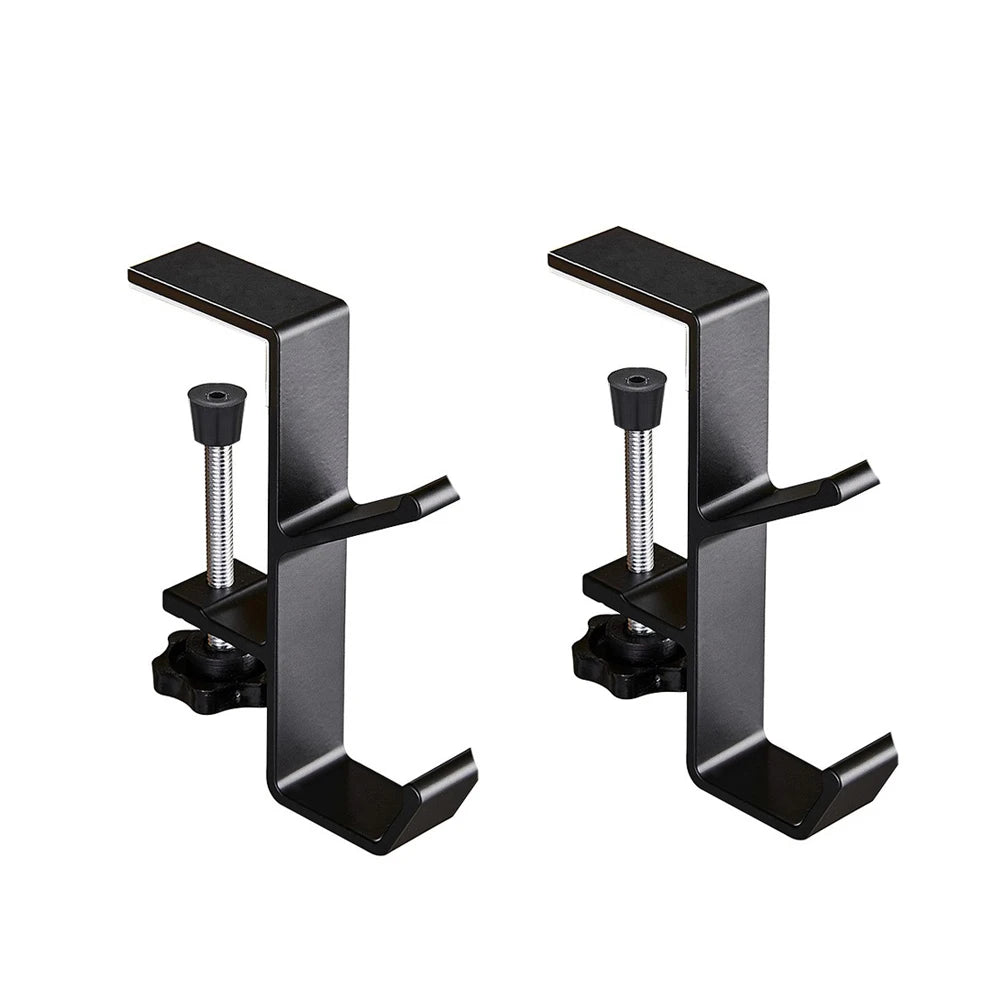 A pair of black foldable aluminum desk hooks designed for hanging bags and coats.
