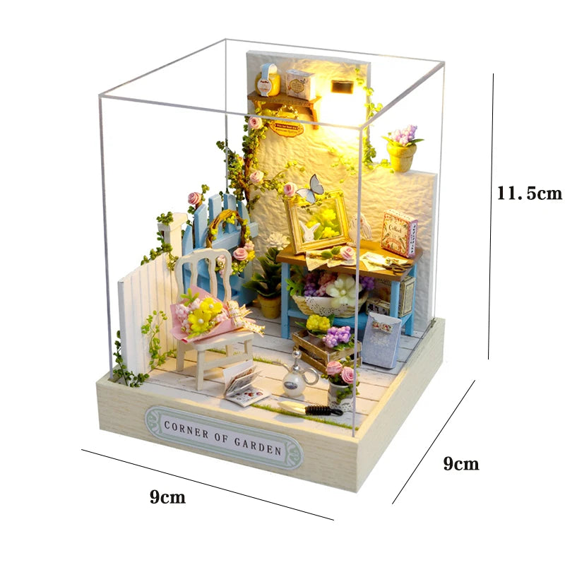 A wooden miniature Japanese sakura tea house kit featuring a garden scene and an LED light.