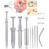 Stainless steel piercing ball grabber tool kit showing various tools and components for piercing