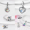 Silver unicorn pegasus charm with rainbow accents and sparkling crystals on a silver chain.