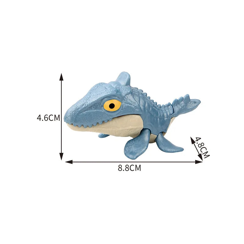 A light blue interactive finger biting dinosaur toy, resembling a Triceratops or Tyrannosaurus, shown with dimensions.
