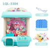 A teal mini claw crane machine for kids with lights and music, featuring coins and dolls.