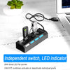 A black USB 2.0 multi-port hub with an independent switch and LED indicator connected to a laptop.