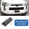 Carbon fiber trim kit for Toyota 4Runner featuring a black panel for the front grille area.