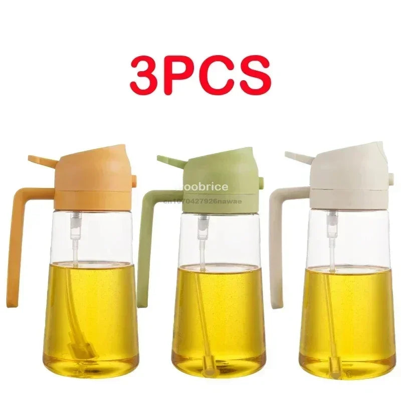 Three amber glass oil spray bottles with white and green tops for cooking.