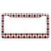 A rectangular aluminum license plate frame with a black and white diamond pattern.
