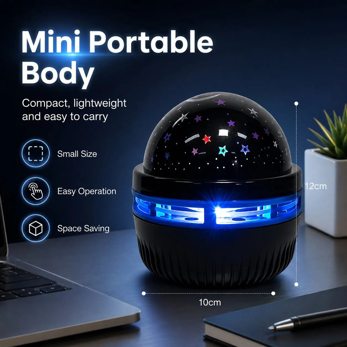 A black mini portable body projector night light with blue LED lights and rotating galaxy effects on a dark surface.